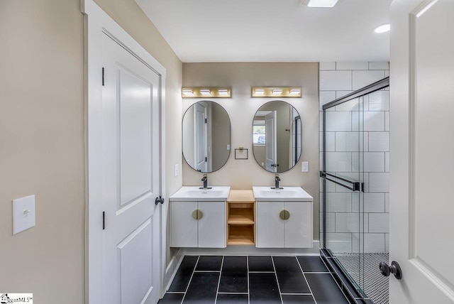 bathroom with tile patterned floors, vanity, and an enclosed shower