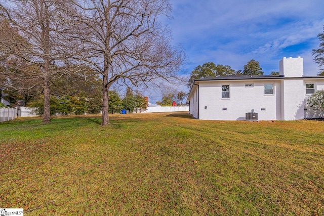 view of yard featuring central AC