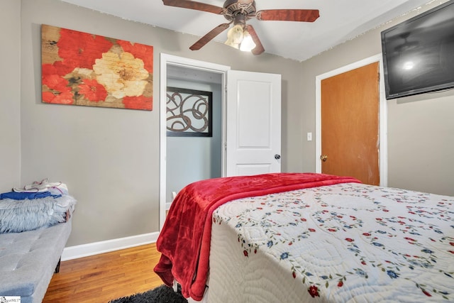 bedroom featuring ceiling fan and wood-type flooring