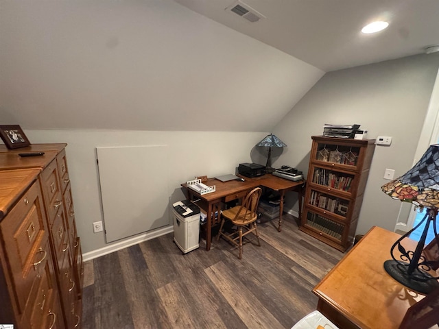 home office with dark hardwood / wood-style floors and vaulted ceiling