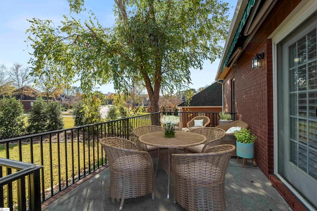 view of patio with a balcony