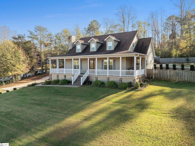 view of front of home with a porch and a front yard