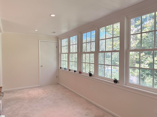 unfurnished sunroom featuring a healthy amount of sunlight