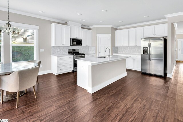 kitchen with backsplash, sink, appliances with stainless steel finishes, dark hardwood / wood-style flooring, and white cabinetry