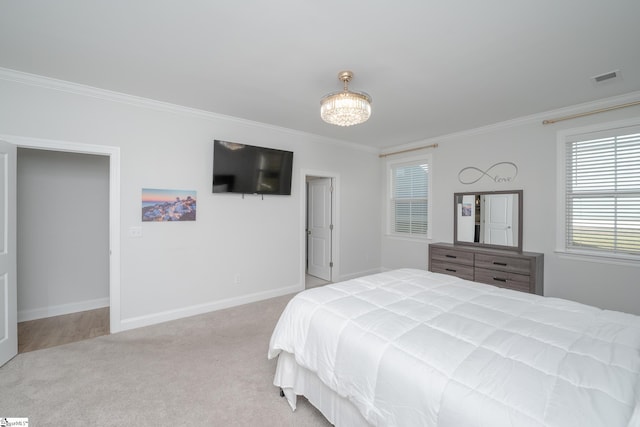 carpeted bedroom with crown molding