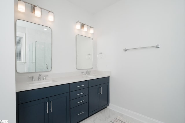 bathroom featuring vanity and a shower with shower door