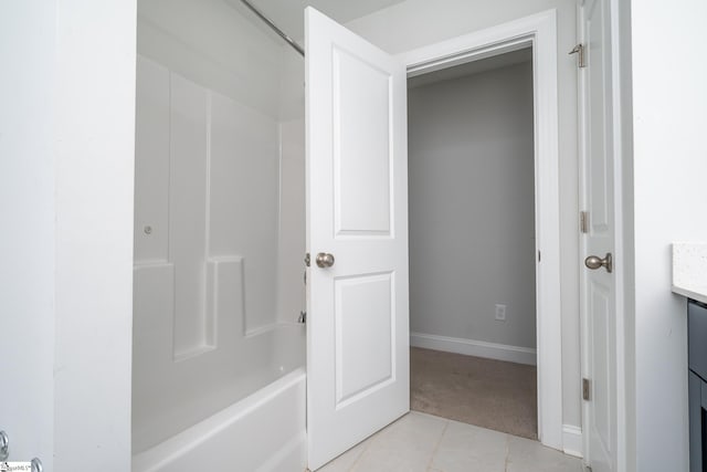 bathroom with tile patterned flooring