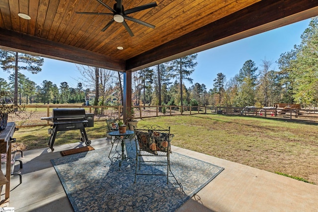 view of patio featuring area for grilling and ceiling fan