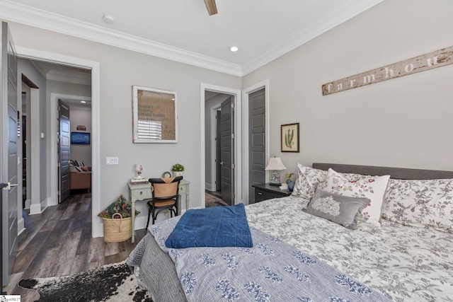 bedroom with ceiling fan, dark hardwood / wood-style floors, and ornamental molding