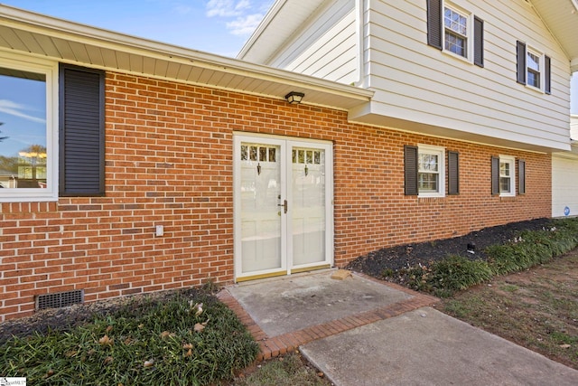 property entrance featuring a garage