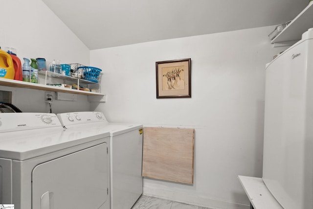 laundry area with washer and clothes dryer