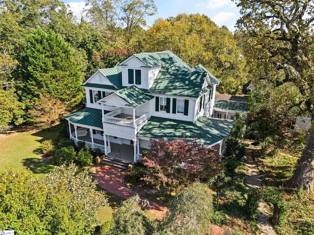 rear view of house with a balcony