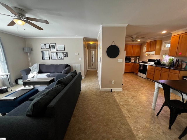 living room with ceiling fan and crown molding