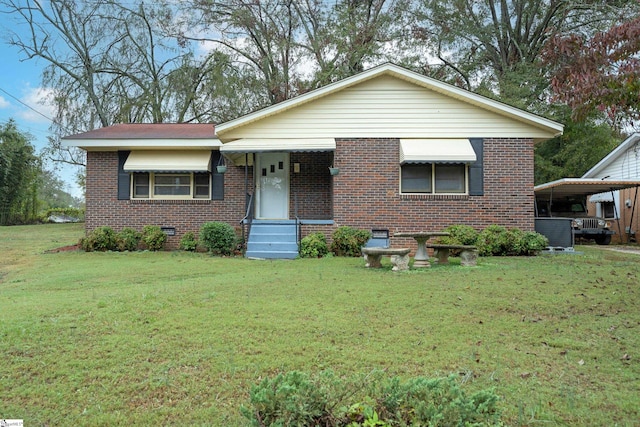 view of front of house with a front yard and cooling unit