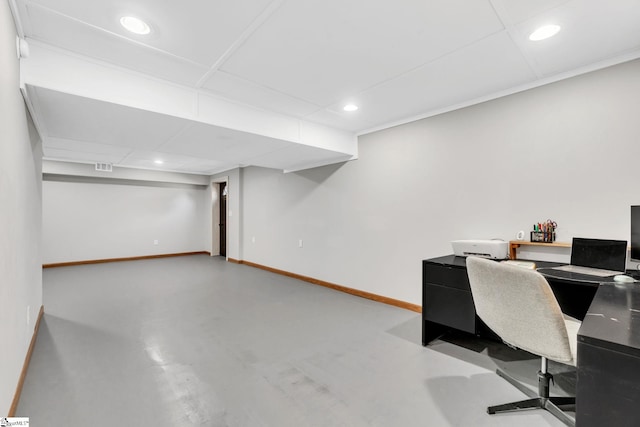 unfurnished office featuring concrete floors