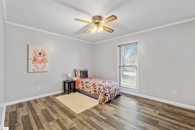 bedroom featuring ceiling fan, crown molding, and dark hardwood / wood-style floors