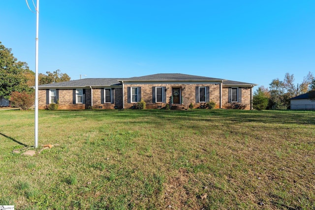 single story home with a front yard