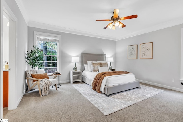 bedroom with ceiling fan, light colored carpet, and crown molding