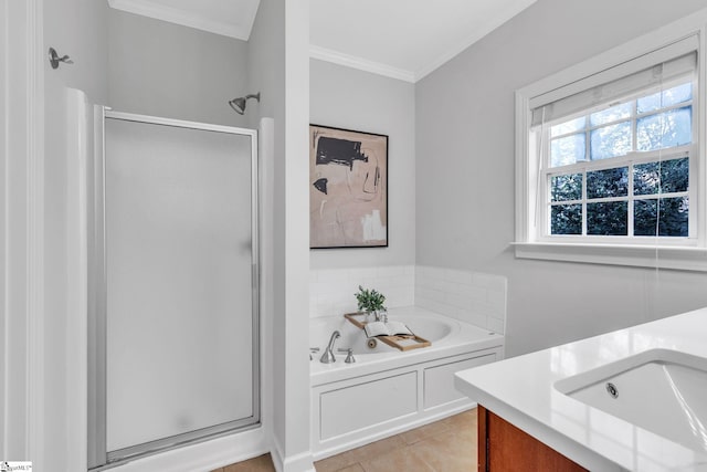 bathroom with tile patterned flooring, vanity, crown molding, and independent shower and bath