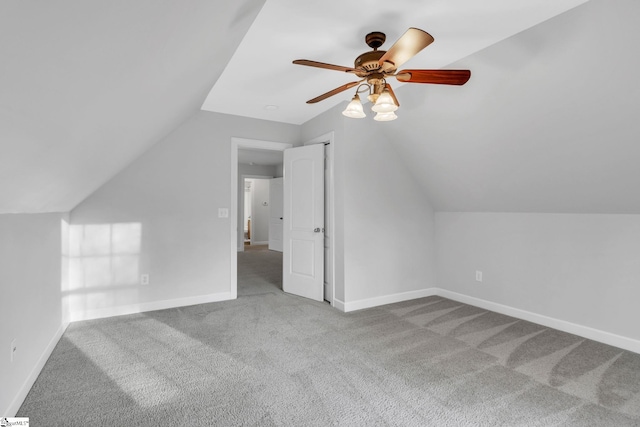 bonus room with carpet flooring, ceiling fan, and lofted ceiling