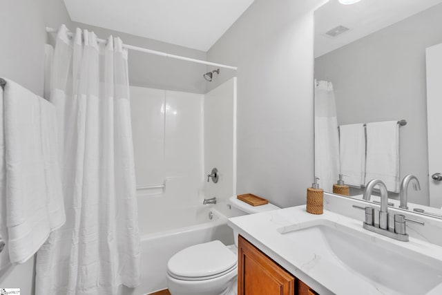 full bathroom with vanity, shower / bathtub combination with curtain, and toilet