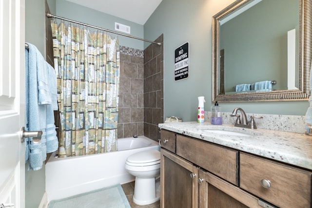 full bathroom featuring tile patterned flooring, vanity, shower / tub combo, and toilet