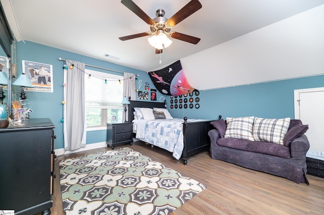 bedroom featuring ceiling fan and light hardwood / wood-style flooring