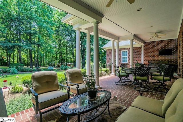 view of patio / terrace featuring ceiling fan