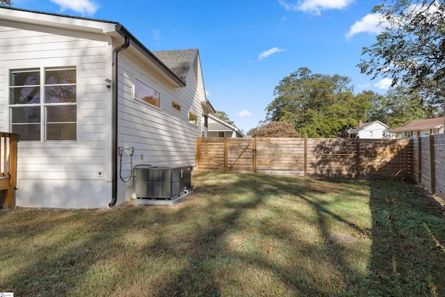 view of yard featuring central AC