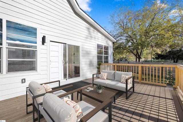 wooden terrace featuring outdoor lounge area