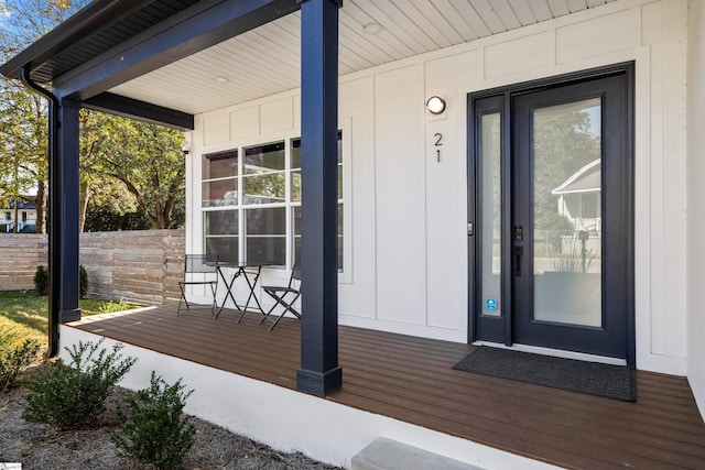 doorway to property with a porch