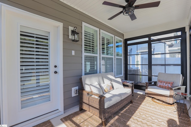 sunroom / solarium with ceiling fan