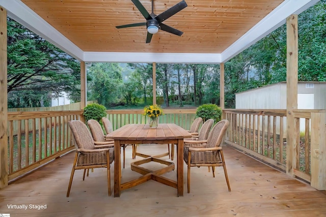 exterior space featuring ceiling fan