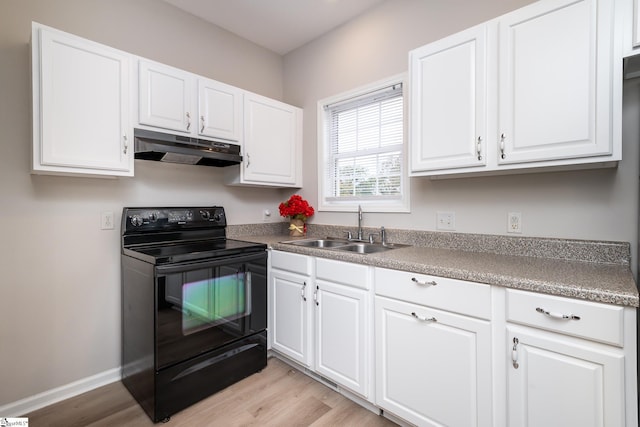 kitchen with sink, white cabinets, light wood-type flooring, and black range with electric cooktop