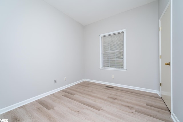 unfurnished room featuring light hardwood / wood-style flooring