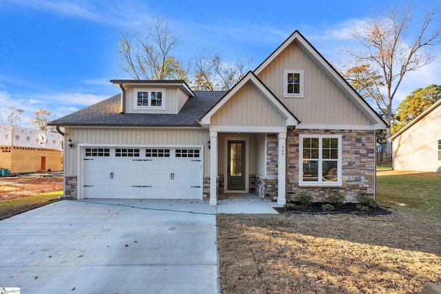 craftsman inspired home with a garage