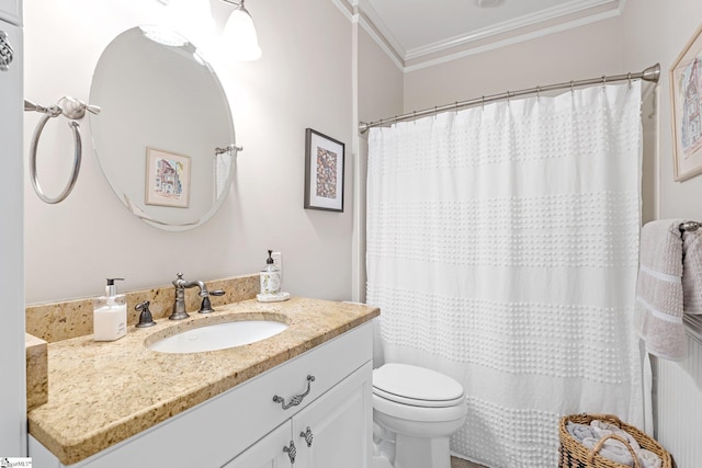 bathroom with curtained shower, crown molding, vanity, and toilet