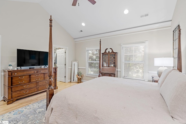 bedroom with light hardwood / wood-style floors, high vaulted ceiling, and ceiling fan