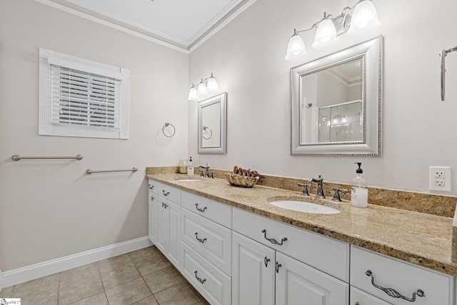 bathroom with tile patterned floors, vanity, and ornamental molding