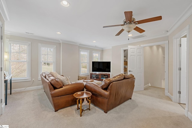 living room featuring light colored carpet, ceiling fan, and ornamental molding