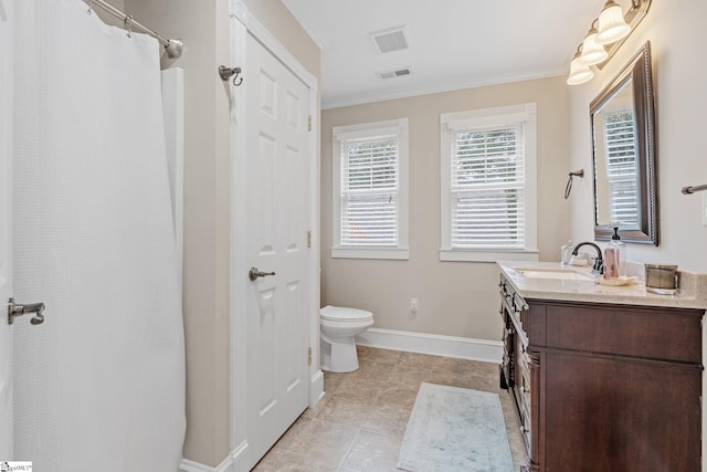 bathroom featuring vanity, tile patterned floors, crown molding, toilet, and curtained shower