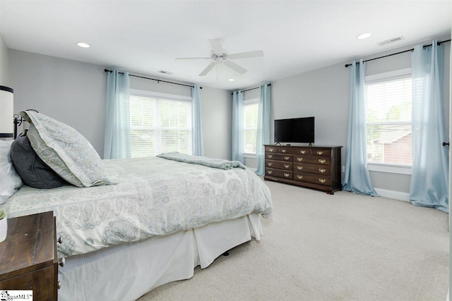 carpeted bedroom with ceiling fan