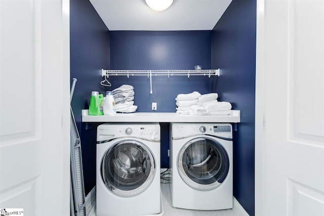 laundry area featuring washer and clothes dryer