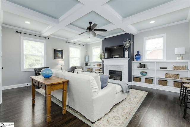 living room with coffered ceiling, crown molding, ceiling fan, beam ceiling, and dark hardwood / wood-style flooring