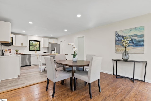 dining area featuring light hardwood / wood-style flooring