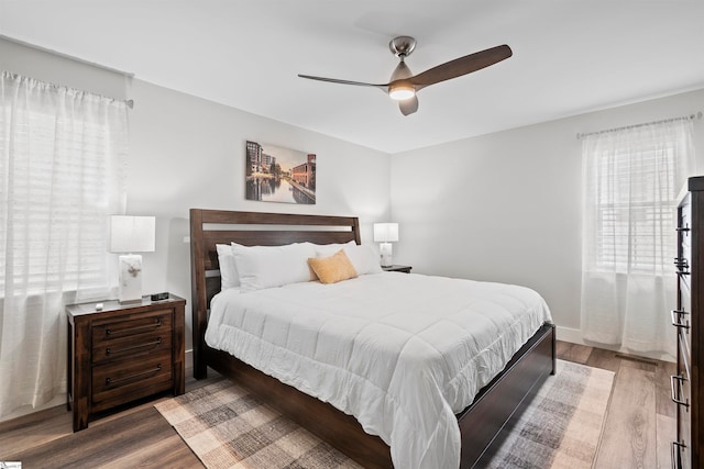 bedroom featuring ceiling fan and wood-type flooring