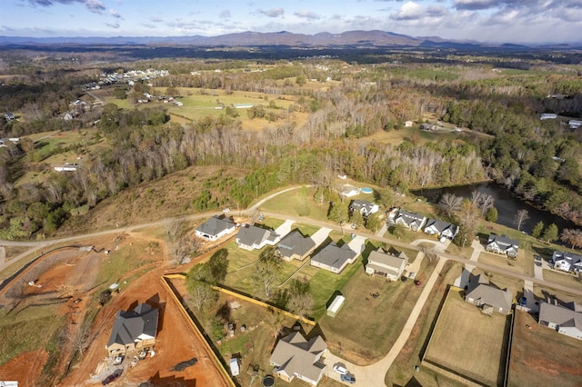 drone / aerial view featuring a mountain view