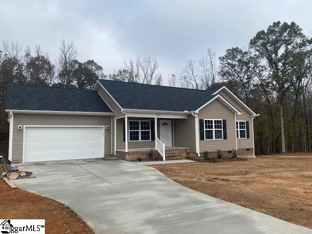 ranch-style home with a garage