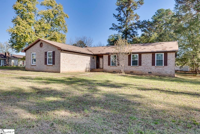 ranch-style home with a front yard