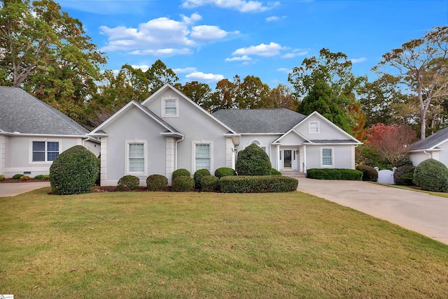 view of front of property with a front lawn